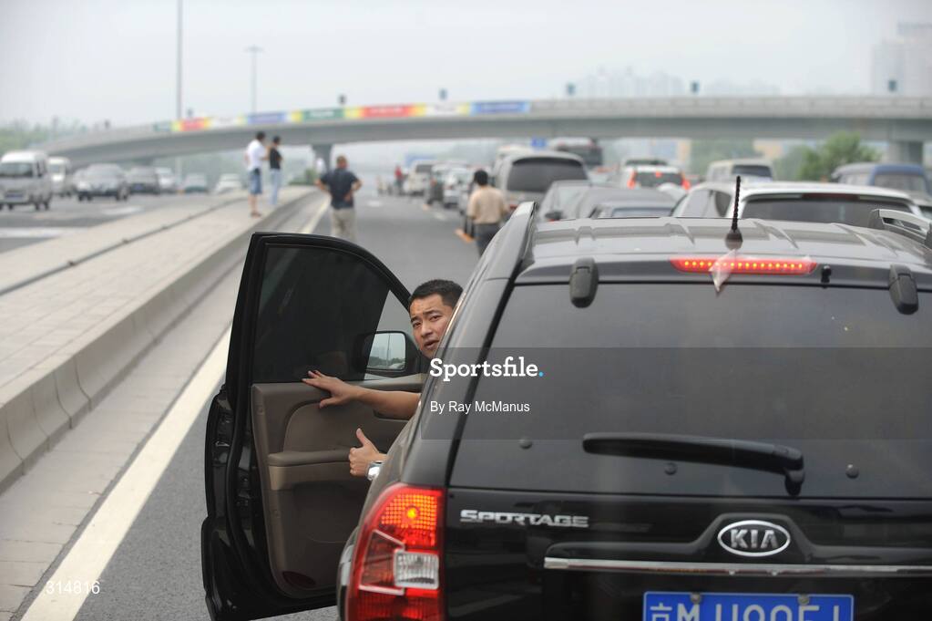 7 August 2008; Drivers wait for clearance to move during heavy traffic on a highway outside the city. Beijing 2008 - Games of the XXIX Olympiad, Beijing, China. Picture credit: Ray McManus / SPORTSFILE