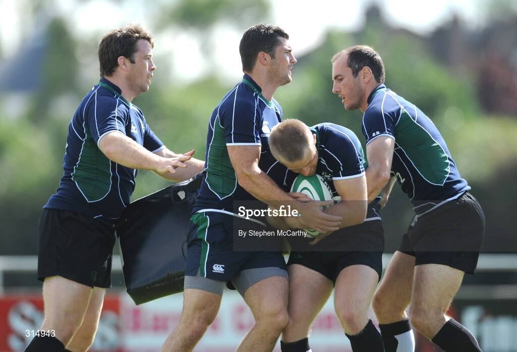 7 August 2008; Ireland's Luke Fitzgerald is tackled by Marcus Horan, left, Rob Kearney and Girvan Dempsey, right, during squad training. Presentation Brothers College Sports Grounds, Dennehy's Cross, Cork. Picture credit: Stephen McCarthy / SPORTSFILE