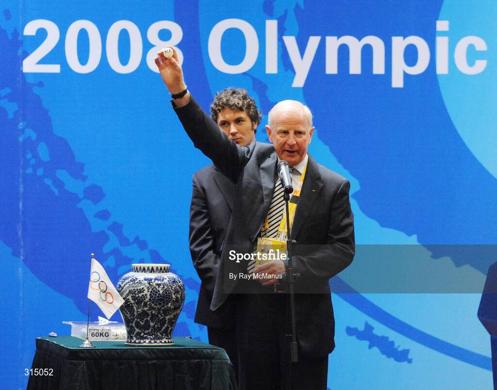 8 August 2008; Pat Hickey, right, President of the OCI and President of the EOC, representing the IOC in the role of official adjudicator, during the draw for the preliminaries of the boxing. Beijing 2008 - Games of the XXIX Olympiad, Beijing Workers Gymnasium, Olympic Green, Beijing, China. Picture credit: Ray McManus / SPORTSFILE