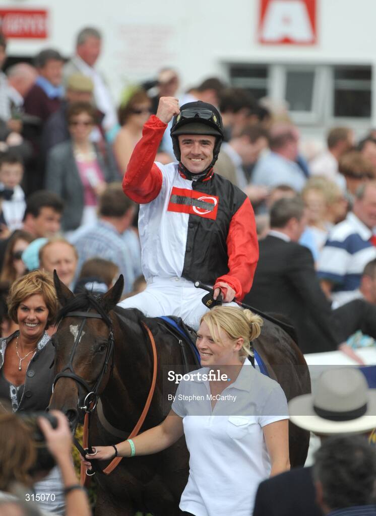30 July 2008; A delighted Ruby Walsh punches the air as he enters the winners enclosure after winning the William Hill Galway Plate onboard Oslot. Galway Racing Festival - Wednesday, Ballybrit, Galway. Picture credit: Stephen McCarthy / SPORTSFILE