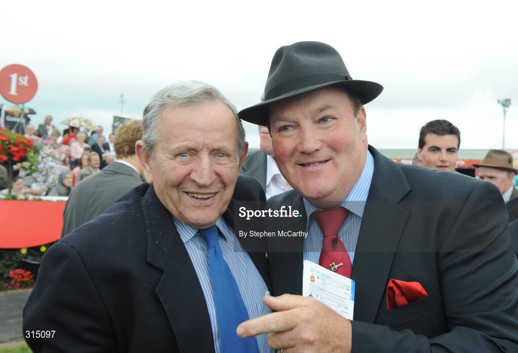 31 July 2008; Trainer Liam McAteer celebrates with Tim Finn, Thurles, Co. Tipperary, after he sent out Tasman to win the Guinness Beginners Chase. Galway Racing Festival - Thursday, Ballybrit, Co. Galway. Picture credit: Stephen McCarthy / SPORTSFILE