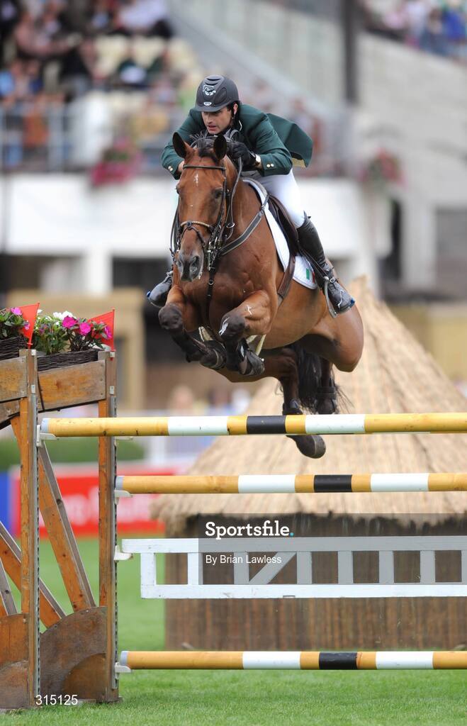 8 August 2008; Nabab's Son, with Denis Lynch up, competes for Ireland at the Samsung Super League with FEI of Ireland Aga Khan Nations Cup. Failte Ireland Dublin Horse Show 2008, The Royal Dublin Society (RDS), Ballsbridge, Dublin. Picture credit: Brian Lawless / SPORTSFILE