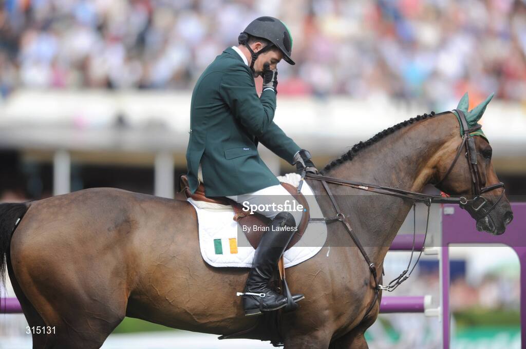 8 August 2008; Ireland's Cian O'Connor aboard Rancorrado reacts during his first round at the Samsung Super League with FEI of Ireland Aga Khan Nations Cup. Failte Ireland Dublin Horse Show 2008, The Royal Dublin Society (RDS), Ballsbridge, Dublin. Picture credit: Brian Lawless / SPORTSFILE