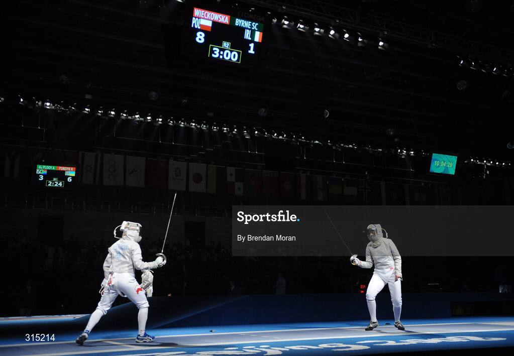 9 August 2008; Siobhan Byrne, right, Ireland, trails Irena Wieckowska, Poland, 8-1, to whom she eventually lost 15-8. Beijing 2008 - Games of the XXIX Olympiad, Fencing Hall of National Convention Centre, Olympic Green, Beijing, China. Picture credit: Brendan Moran / SPORTSFILE