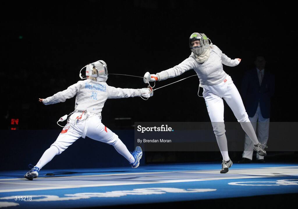 9 August 2008; Siobhan Byrne, right, Ireland, in action against Irena Wieckowska, Poland, to whom she lost 15-8. Beijing 2008 - Games of the XXIX Olympiad, Fencing Hall of National Convention Centre, Olympic Green, Beijing, China. Picture credit: Brendan Moran / SPORTSFILE