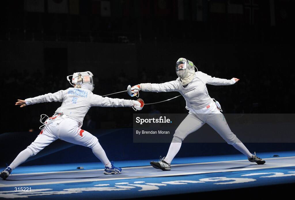 9 August 2008; Siobhan Byrne, right, Ireland, in action against Irena Wieckowska, Poland, to whom she lost 15-8. Beijing 2008 - Games of the XXIX Olympiad, Fencing Hall of National Convention Centre, Olympic Green, Beijing, China. Picture credit: Brendan Moran / SPORTSFILE