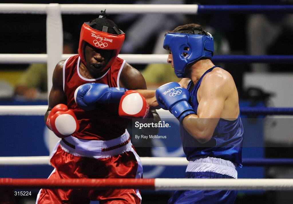 9 August 2008; Ken Egan, Ireland, in action against Julius Jackson, Virgin Islands, left, during the first round of the Light heavy weight, 81 kg, contest. Beijing 2008 - Games of the XXIX Olympiad, Beijing Workers Gymnasium, Olympic Green, Beijing, China. Picture credit: Ray McManus / SPORTSFILE