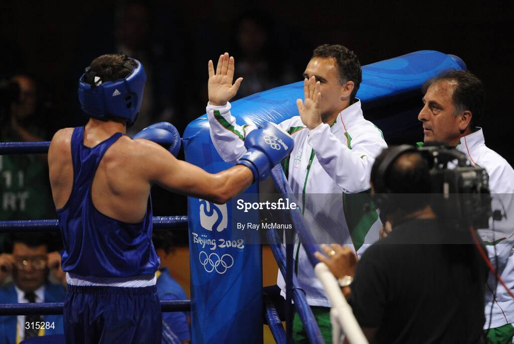 9 August 2008; Ireland's Ken Egan celebrates victory with coach Billy Walsh. Beijing 2008 - Games of the XXIX Olympiad, Beijing Workers Gymnasium, Olympic Green, Beijing, China. Picture credit: Ray McManus / SPORTSFILE