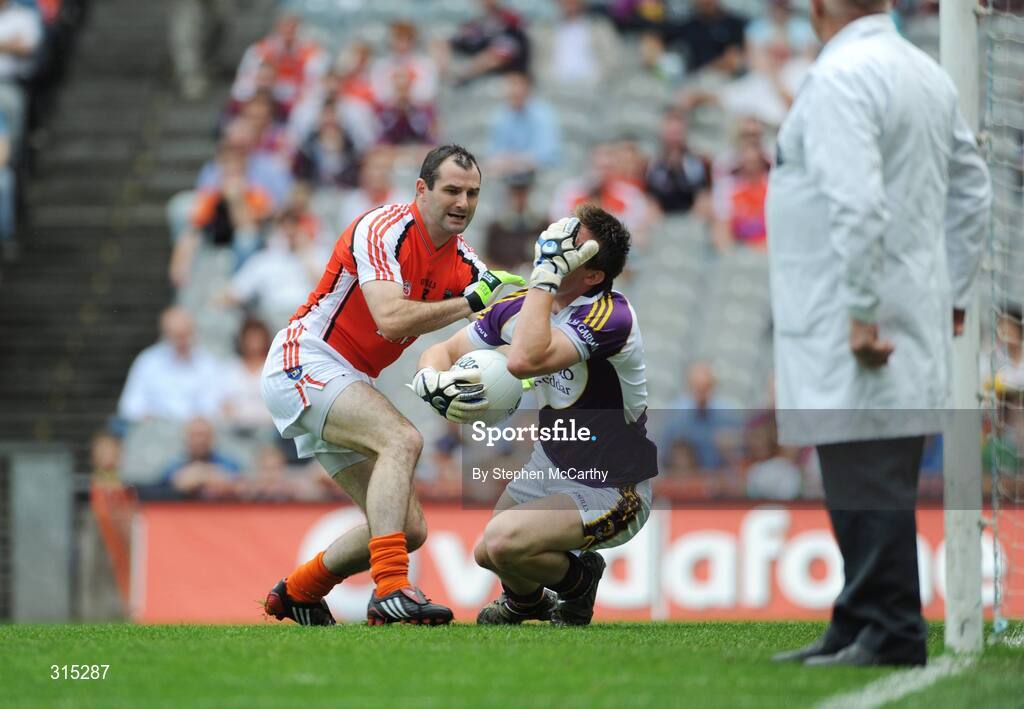 9 August 2008; Wexford goalkeeper Anthony Masterson holds his face after an altercation with Steven McDonnell, Armagh. GAA Football All-Ireland Senior Championship Quarter-Final, Armagh v Wexford, Croke Park, Dublin. Picture credit: Stephen McCarthy / SPORTSFILE