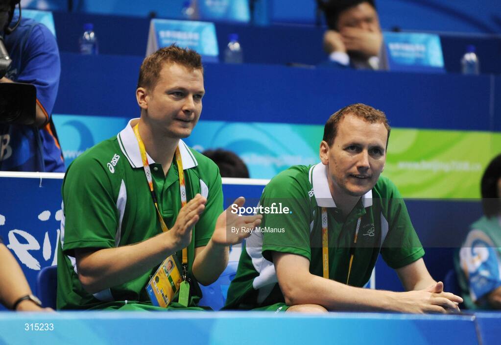 9 August 2008; Team manager Donal O'Halloran, right, and team coach Jim Laugenson watch on anxiously as Scott Evans, Ireland, plays his first round game against Marc Zwiebler, Germany. Beijing 2008 - Games of the XXIX Olympiad, Beijing University of Technology Gymnasium, Beijing, China. Picture credit: Ray McManus / SPORTSFILE