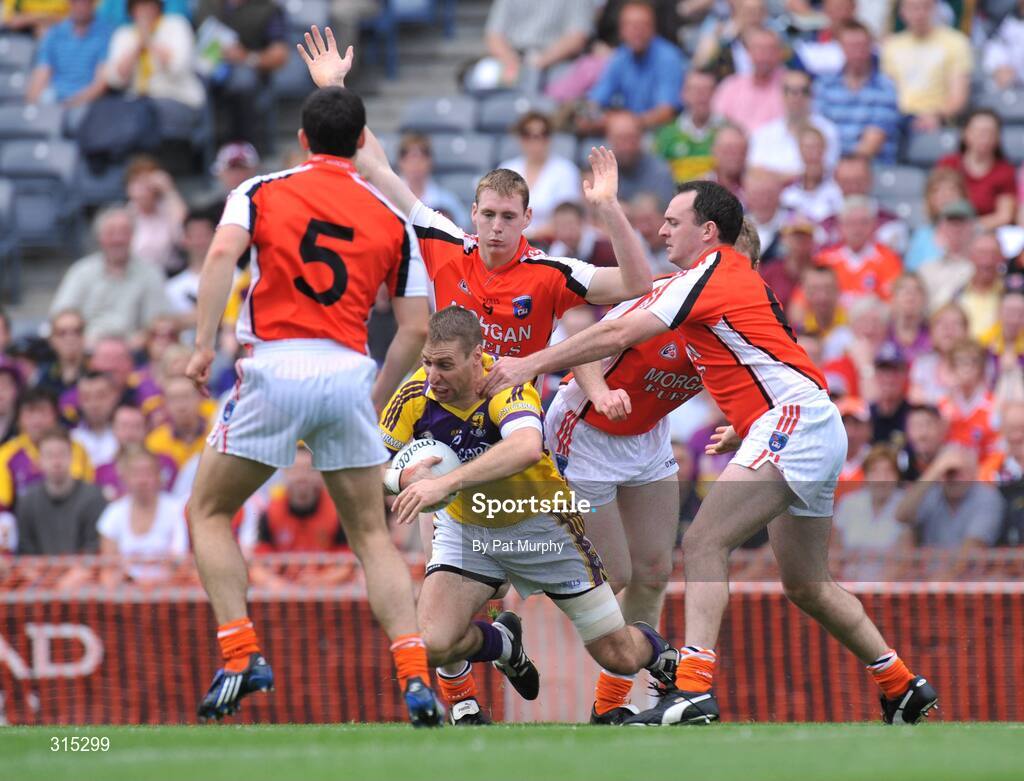 9 August 2008; Matty Forde, Wexford, in action against, from left, Aaron Kernan, 5, Kieran Toner, Francie Bellew, hidden, and Aidan O'Rourke, Armagh. GAA Football All-Ireland Senior Championship Quarter-Final, Armagh v Wexford, Croke Park, Dublin. Picture credit: Pat Murphy / SPORTSFILE