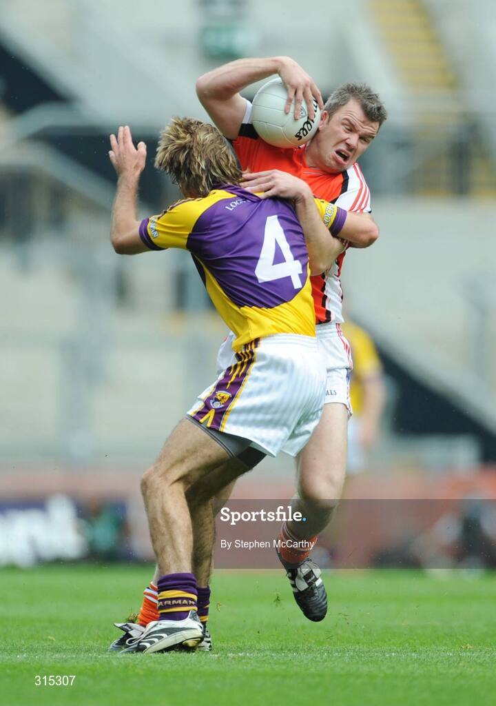 9 August 2008; Ronan Clarke, Armagh, in action against Brian Malone, Wexford. GAA Football All-Ireland Senior Championship Quarter-Final, Armagh v Wexford, Croke Park, Dublin. Picture credit: Stephen McCarthy / SPORTSFILE