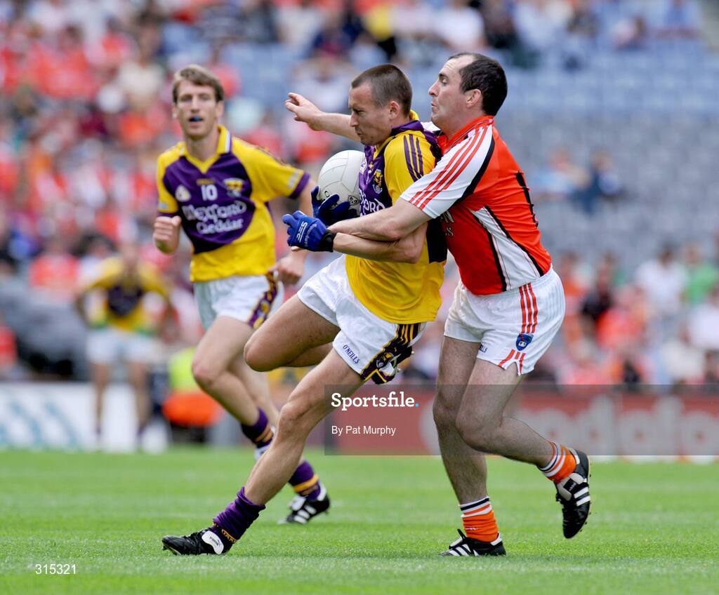 9 August 2008; Adrian Morrissey, Wexford, in action against Martin O'Rourke, Armagh. GAA Football All-Ireland Senior Championship Quarter-Final, Armagh v Wexford, Croke Park, Dublin. Picture credit: Pat Murphy / SPORTSFILE