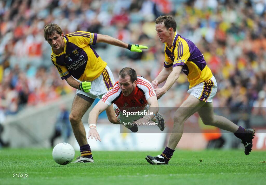 9 August 2008; Ciaran McKeever, Armagh, in action against Brian Malone, left, and Davis Walsh, Wexford. GAA Football All-Ireland Senior Championship Quarter-Final, Armagh v Wexford, Croke Park, Dublin. Picture credit: Stephen McCarthy / SPORTSFILE