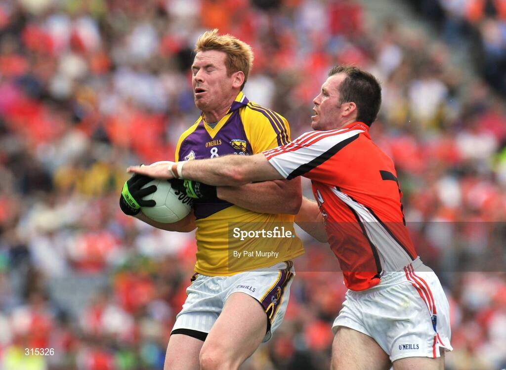 9 August 2008; Eric Bradley, Wexford, in action against Ciaran McKeever, Armagh. GAA Football All-Ireland Senior Championship Quarter-Final, Armagh v Wexford, Croke Park, Dublin. Picture credit: Pat Murphy / SPORTSFILE
