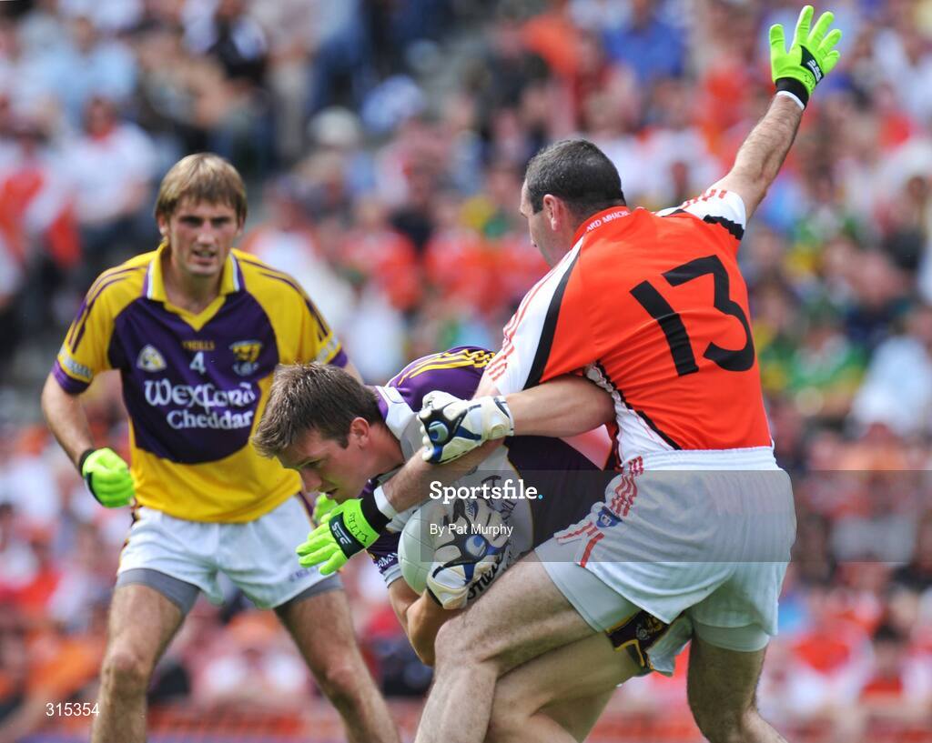9 August 2008; Anthony Masterson, Wexford, in action against Steven McDonnell, Armagh. GAA Football All-Ireland Senior Championship Quarter-Final, Armagh v Wexford, Croke Park, Dublin. Picture credit: Pat Murphy / SPORTSFILE