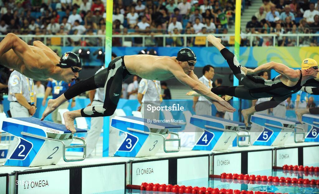 9 August 2008; Ireland's Andrew Bree, centre, in action during his heat of the men's 100m breaststroke in which he set a new national record of 1.01.76. Beijing 2008 - Games of the XXIX Olympiad, National Aquatic Centre, Olympic Green, Beijing, China. Picture credit: Brendan Moran / SPORTSFILE
