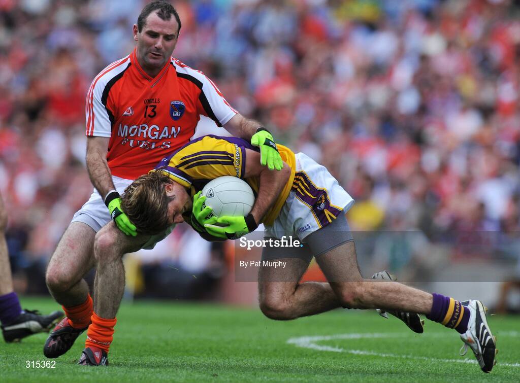 9 August 2008; Brian Malone, Wexford, in action against Steven McDonnell, Armagh. GAA Football All-Ireland Senior Championship Quarter-Final, Armagh v Wexford, Croke Park, Dublin. Picture credit: Pat Murphy / SPORTSFILE