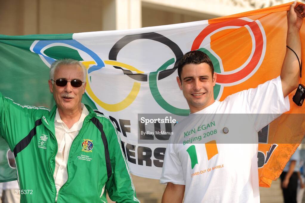 9 August 2008; Paul, left, and John Egan celebrate after Ken had won his firtst round contest. Beijing 2008 - Games of the XXIX Olympiad, Beijing Workers Gymnasium, Olympic Green, Beijing, China. Picture credit: Ray McManus / SPORTSFILE