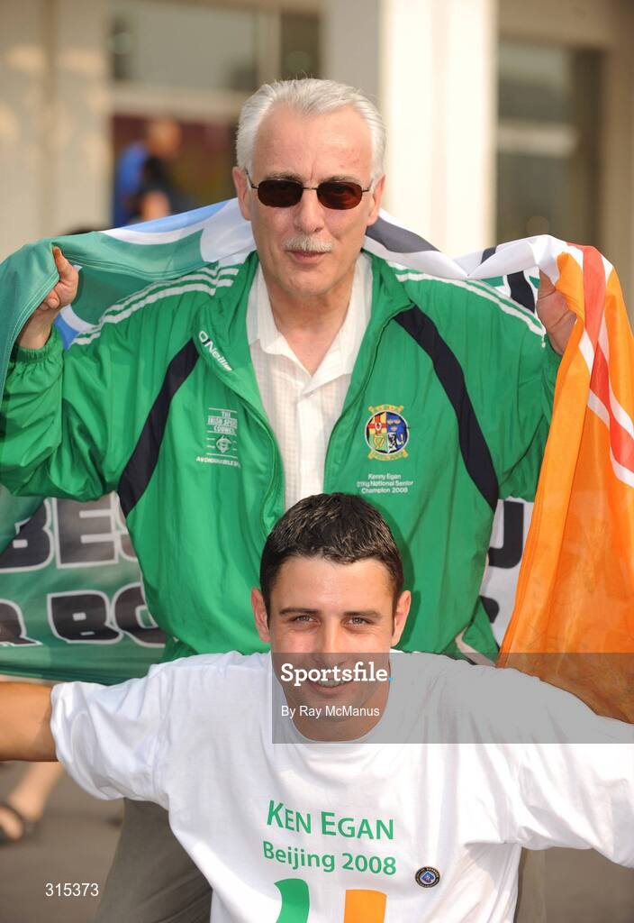9 August 2008; Paul and John Egan celebrate after Ken had won his firtst round contest. Beijing 2008 - Games of the XXIX Olympiad, Beijing Workers Gymnasium, Olympic Green, Beijing, China. Picture credit: Ray McManus / SPORTSFILE