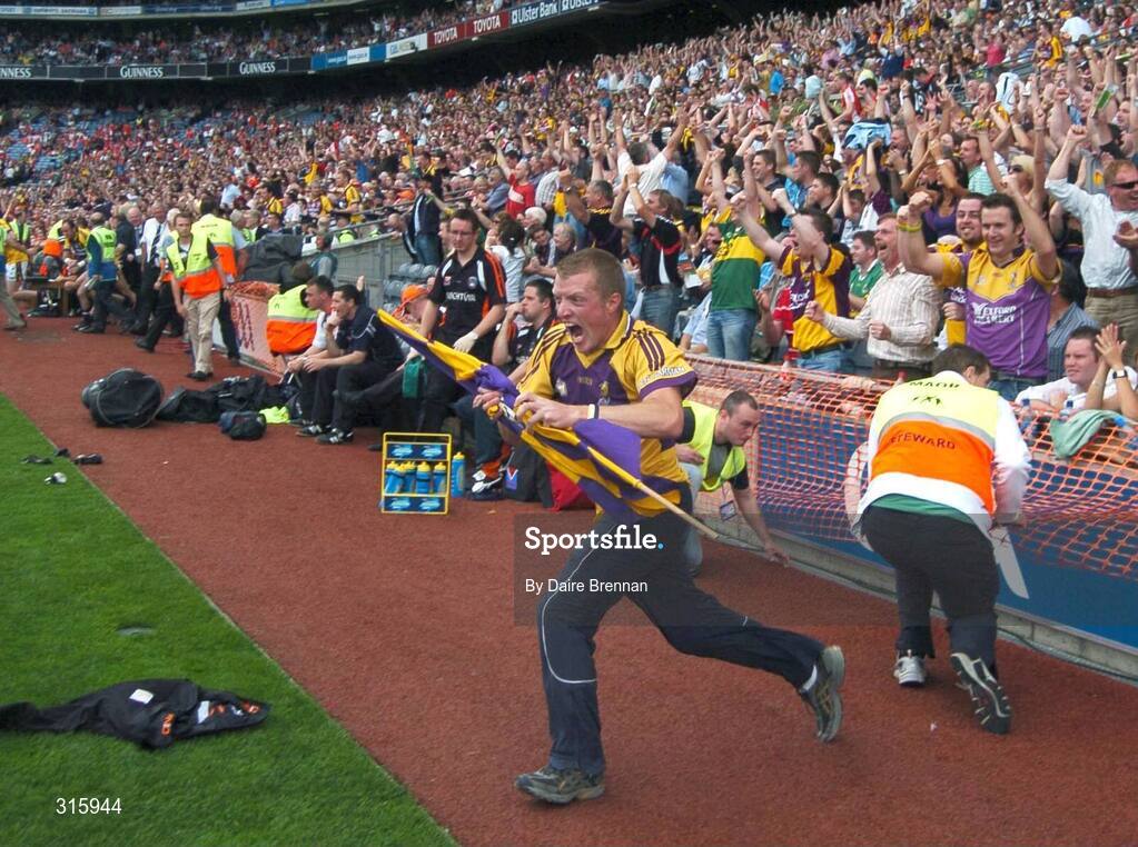 9 August 2008; A delighted Wexford supporter runs onto the pitch after the game. GAA Football All-Ireland Senior Championship Quarter-Final, Armagh v Wexford, Croke Park, Dublin. Picture credit: Daire Brennan / SPORTSFILE