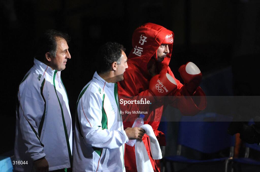 14 August 2008; Ireland's Kenny Egan with head coach Billy Walsh and technical coach Zaur Antia, left, make their way ringside before the 'round of 16' Light heavy weight, 81 kg, contest. Beijing 2008 - Games of the XXIX Olympiad, Beijing Workers Gymnasium, Olympic Green, Beijing, China. Picture credit: Ray McManus / SPORTSFILE