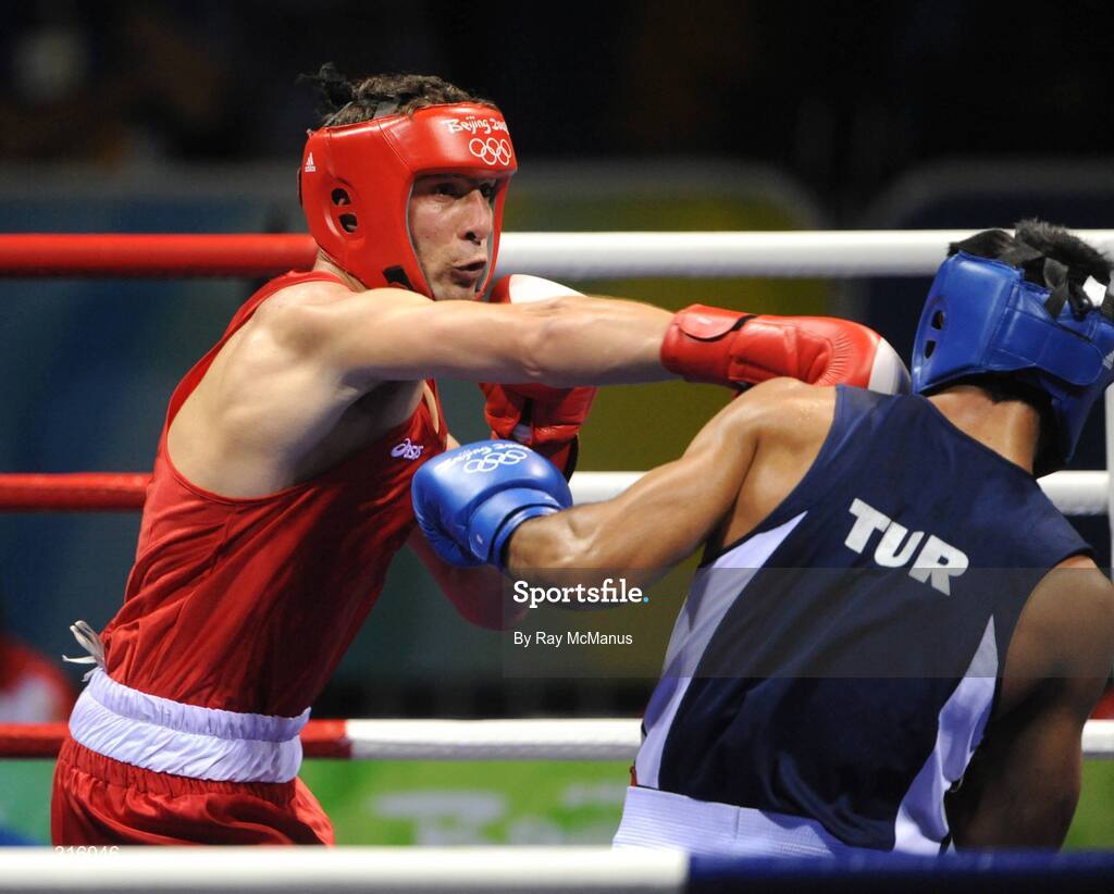 14 August 2008; Kenny Egan, Ireland, in action against Bahram Muzaffer, Turkey, in the blue vest, during the 'round of 16' Light heavy weight, 81 kg, contest. Egan won 10pts to 2. Beijing 2008 - Games of the XXIX Olympiad, Beijing Workers Gymnasium, Olympic Green, Beijing, China. Picture credit: Ray McManus / SPORTSFILE