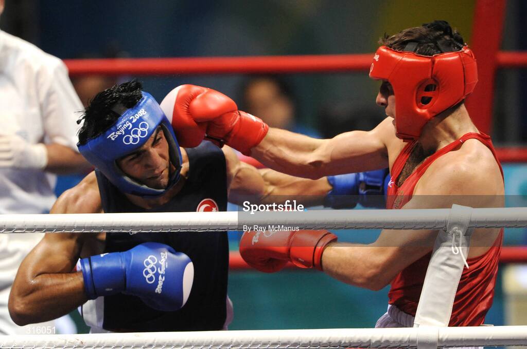 14 August 2008; Kenny Egan, Ireland, in action against Bahram Muzaffer, Turkey, in the blue vest, during the 'round of 16' Light heavy weight, 81 kg, contest. Egan won 10pts to 2. Beijing 2008 - Games of the XXIX Olympiad, Beijing Workers Gymnasium, Olympic Green, Beijing, China. Picture credit: Ray McManus / SPORTSFILE