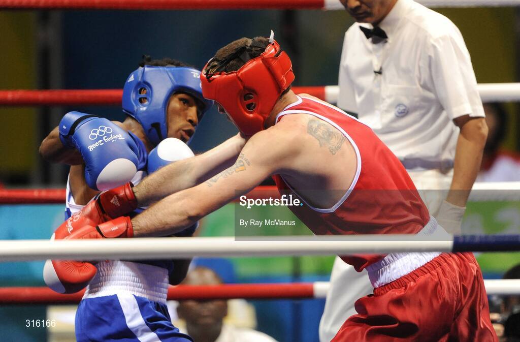 14 August 2008; John Joe Joyce, Ireland, in action against Felix Diaz, Dominican Republic, in the blue vest, during the 'round of 16' Light welter weight, 64 kg, contest. Beijing 2008 - Games of the XXIX Olympiad, Beijing Workers Gymnasium, Olympic Green, Beijing, China. Picture credit: Ray McManus / SPORTSFILE