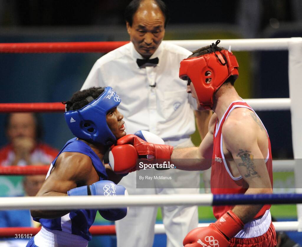 14 August 2008; John Joe Joyce, Ireland, in action against Felix Diaz, Dominican Republic, in the blue vest, during the 'round of 16' Light welter weight, 64 kg, contest. Beijing 2008 - Games of the XXIX Olympiad, Beijing Workers Gymnasium, Olympic Green, Beijing, China. Picture credit: Ray McManus / SPORTSFILE