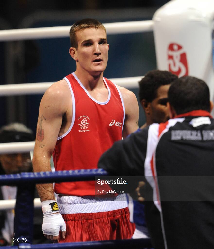 14 August 2008; Ireland's John Joe Joyce shows his disappointment after deafeat to Felix Diaz, of the Dominican Republic in the 'round of 16' Light welter weight, 64 kg, contest. Beijing 2008 - Games of the XXIX Olympiad, Beijing Workers Gymnasium, Olympic Green, Beijing, China. Picture credit: Ray McManus / SPORTSFILE