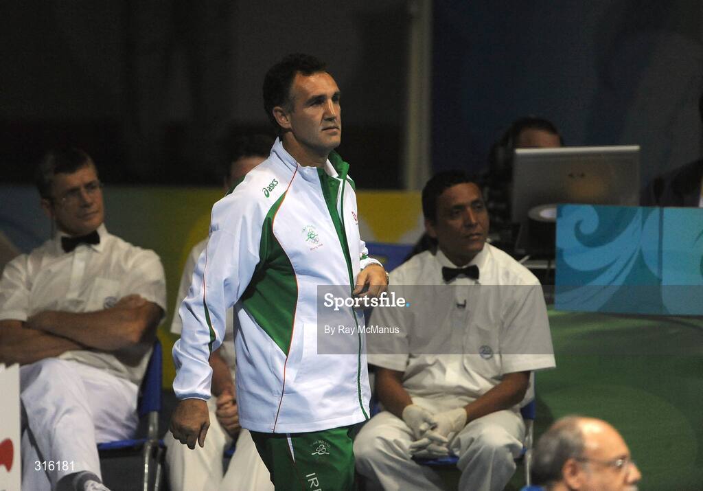 14 August 2008; Head coach Billy Walsh leaves the arena having been ordered out by the referee during the John Joe Joyce, Ireland v Felix Diaz, Dominican Republic, 'round of 16' Light welter weight, 64 kg, contest. Beijing 2008 - Games of the XXIX Olympiad, Beijing Workers Gymnasium, Olympic Green, Beijing, China. Picture credit: Ray McManus / SPORTSFILE