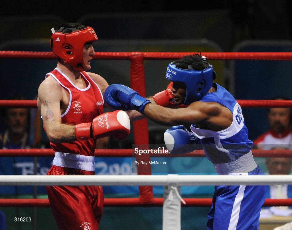 14 August 2008; John Joe Joyce, Ireland, in action against Felix Diaz, Dominican Republic, in the blue vest, during the 2nd round of the 'round of 16' Light welter weight, 64 kg, contest. Beijing 2008 - Games of the XXIX Olympiad, Beijing Workers Gymnasium, Olympic Green, Beijing, China. Picture credit: Ray McManus / SPORTSFILE