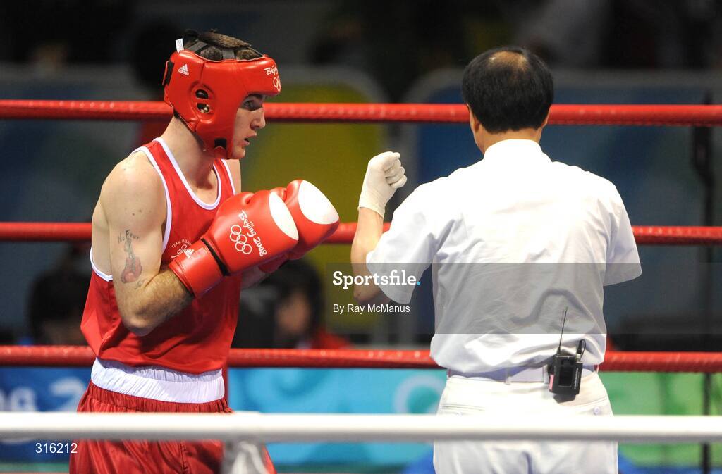 14 August 2008; Ireland's John Joe Joyce is cautioned for holding in the first round of the 'round of 16' Light welter weight, 64 kg, contest. Beijing 2008 - Games of the XXIX Olympiad, Beijing Workers Gymnasium, Olympic Green, Beijing, China. Picture credit: Ray McManus / SPORTSFILE