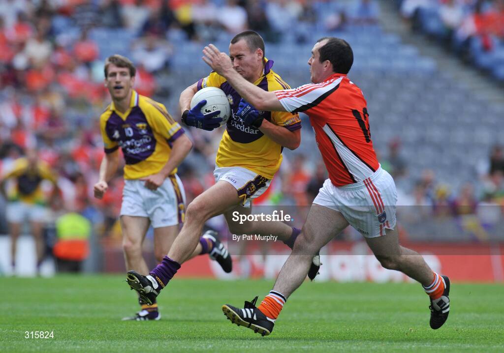 9 August 2008; Adrian Morrissey, Wexford, in action against Martin O'Rourke, Armagh. GAA Football All-Ireland Senior Championship Quarter-Final, Armagh v Wexford, Croke Park, Dublin. Picture credit: Pat Murphy / SPORTSFILE