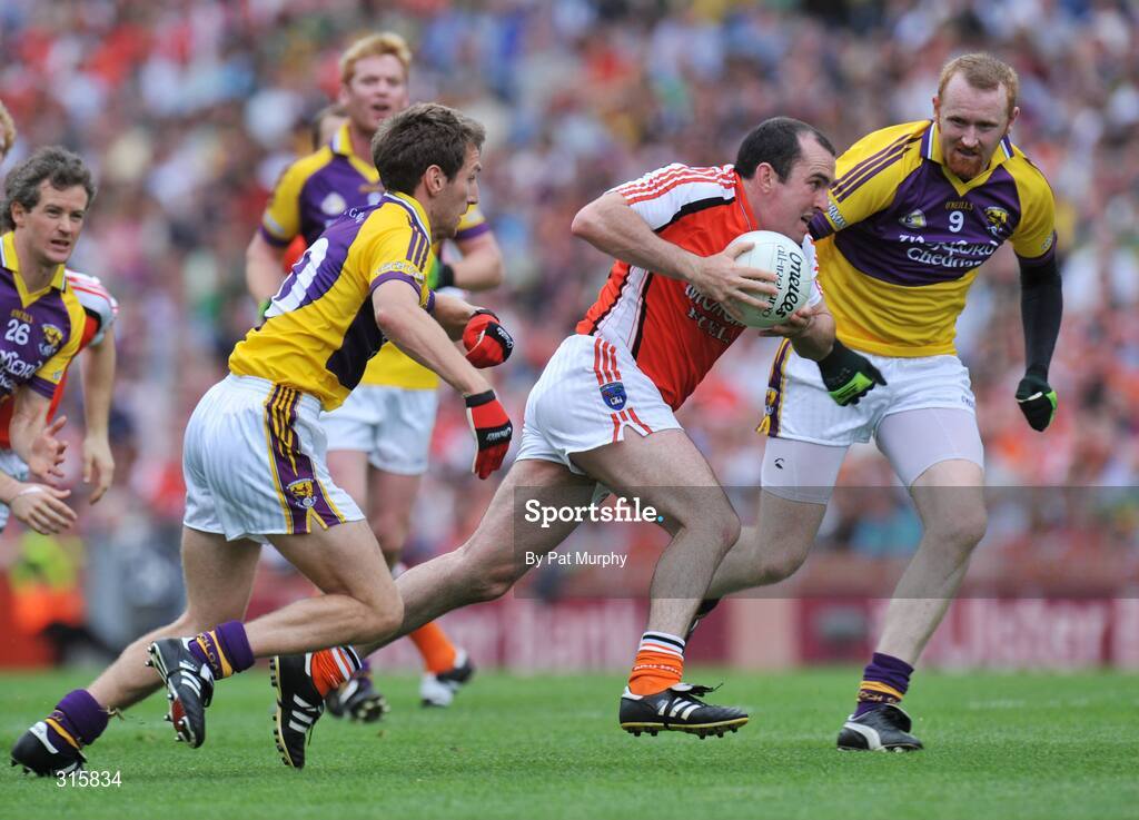 9 August 2008; Martin O'Rourke, Armagh, in action against Redmond Barry, left, and Brendan Doyle, Wexford. GAA Football All-Ireland Senior Championship Quarter-Final, Armagh v Wexford, Croke Park, Dublin. Picture credit: Pat Murphy / SPORTSFILE
