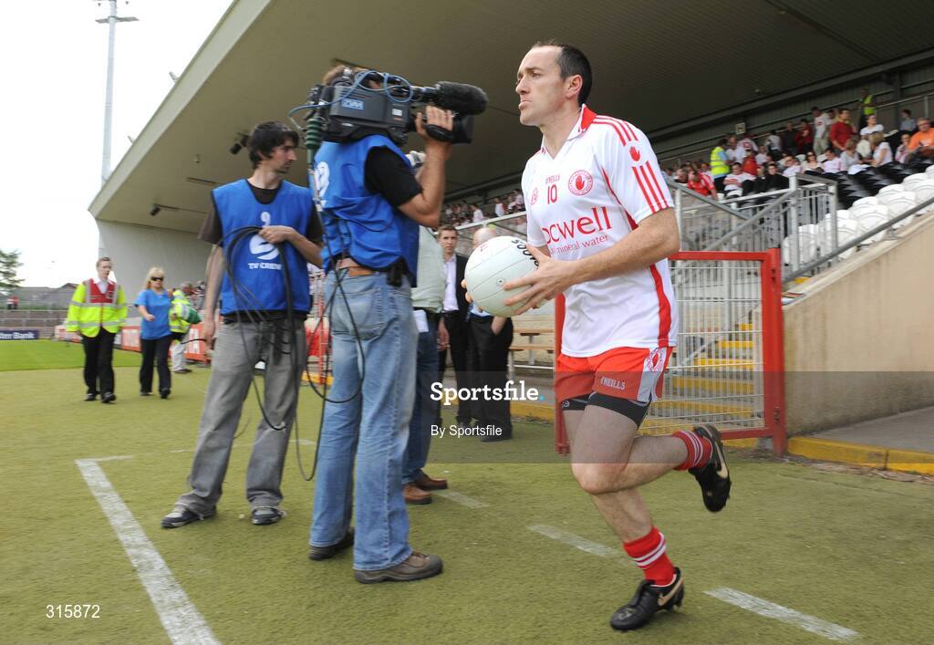 26 July 2008; Tyrone captain Brian Dooher makes his way out on to the pitch for the start of the game. GAA Football All-Ireland Senior Championship Qualifier - Rd 2, Tyrone v Westmeath, Healy Park, Omagh, Co. Tyrone. Photo by Sportsfile