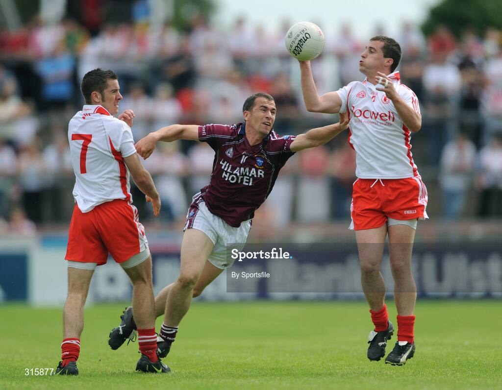 26 July 2008; Brian McGuigan, right, and Philip Jordan, Tyrone, in action against Damien Healy, Westmeath. GAA Football All-Ireland Senior Championship Qualifier - Rd 2, Tyrone v Westmeath, Healy Park, Omagh, Co. Tyrone. Photo by Sportsfile