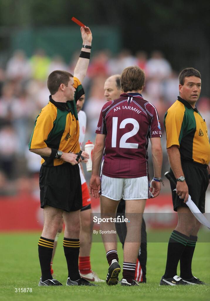 26 July 2008; Doran Harte, Westmeath, is shown the red card by referee Padraig Hughes. GAA Football All-Ireland Senior Championship Qualifier - Rd 2, Tyrone v Westmeath, Healy Park, Omagh, Co. Tyrone. Photo by Sportsfile