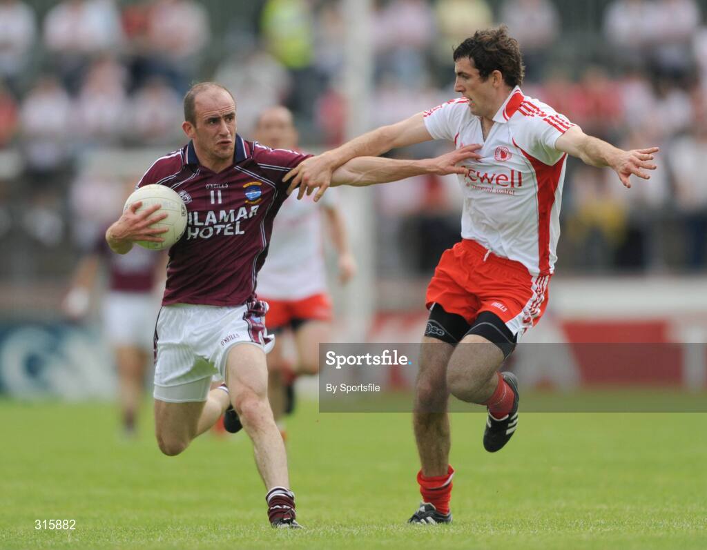 26 July 2008; John Smyth, Westmeath, in action against Justin McMahon, Tyrone. GAA Football All-Ireland Senior Championship Qualifier - Rd 2, Tyrone v Westmeath, Healy Park, Omagh, Co. Tyrone. Photo by Sportsfile