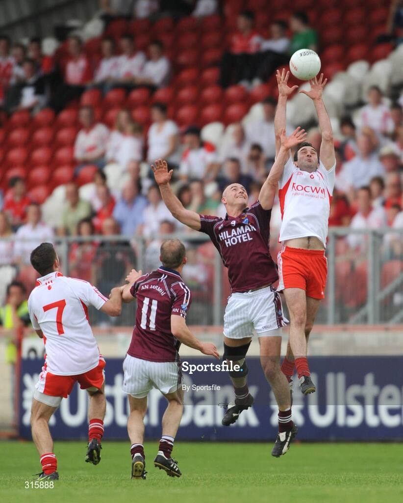 26 July 2008; Enda McGinley, Tyrone, in action against Donal O'Donoghue, Westmeath. GAA Football All-Ireland Senior Championship Qualifier - Rd 2, Tyrone v Westmeath, Healy Park, Omagh, Co. Tyrone. Photo by Sportsfile