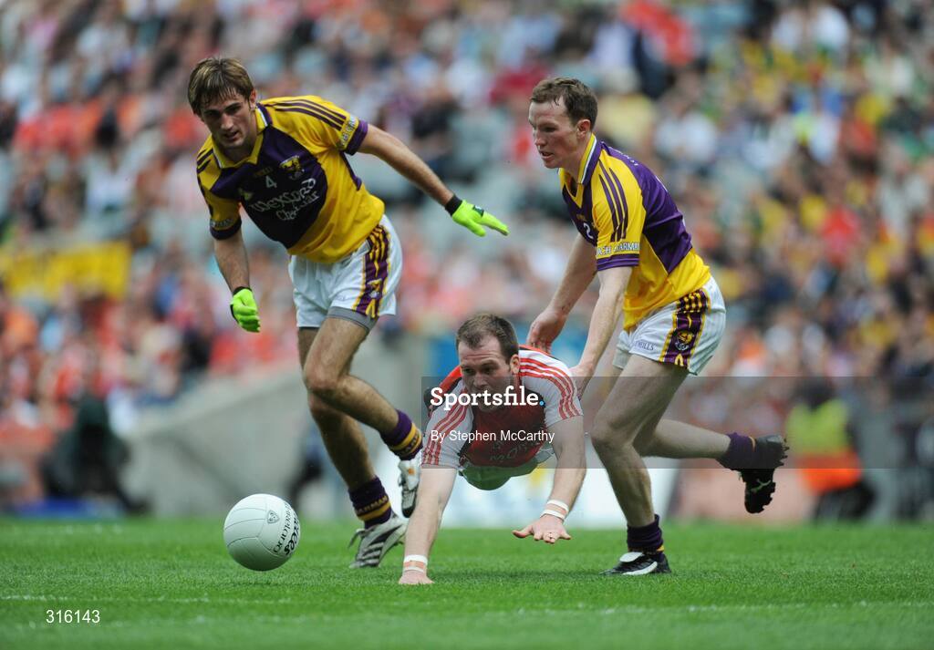 9 August 2008; Ciaran McKeever, Armagh, in action against Brian Malone, left, and Davis Walsh, Wexford. GAA Football All-Ireland Senior Championship Quarter-Final, Armagh v Wexford, Croke Park, Dublin. Picture credit: Stephen McCarthy / SPORTSFILE