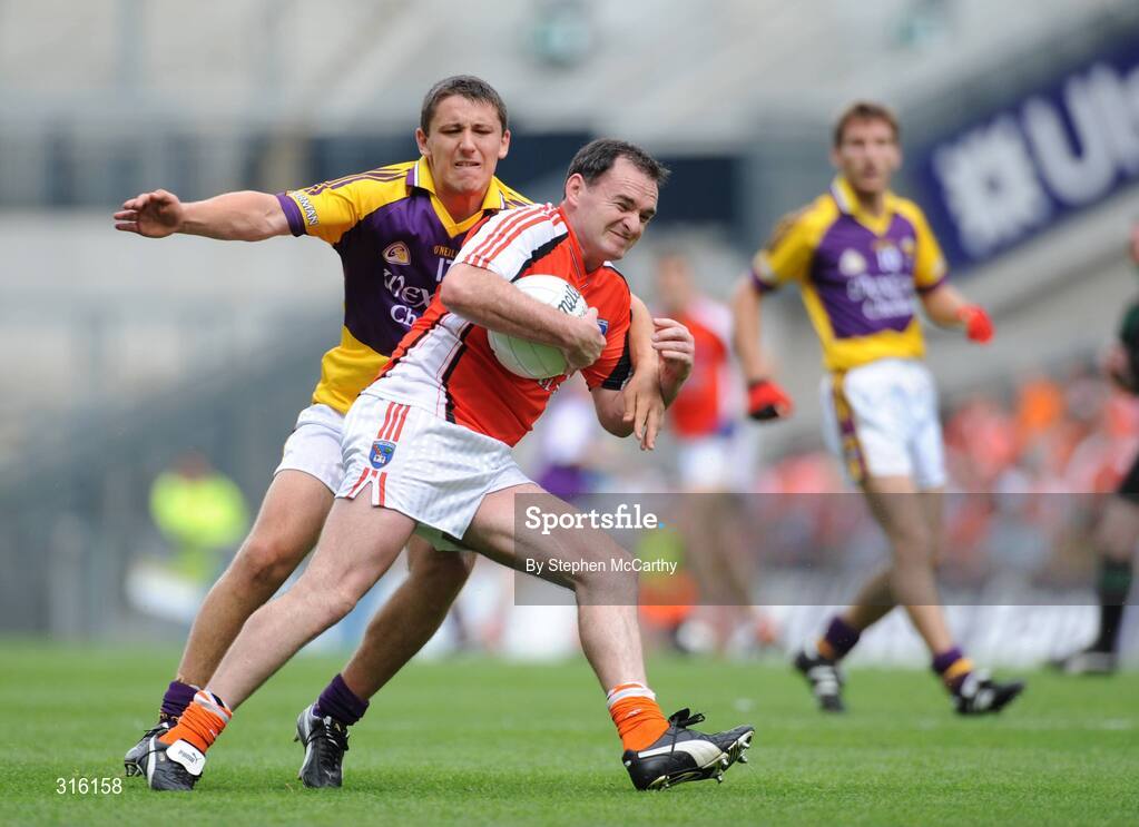 9 August 2008; Aidan O'Rourke, Armagh, in action against Ciaran Lyng, Wexford. GAA Football All-Ireland Senior Championship Quarter-Final, Armagh v Wexford, Croke Park, Dublin. Picture credit: Stephen McCarthy / SPORTSFILE
