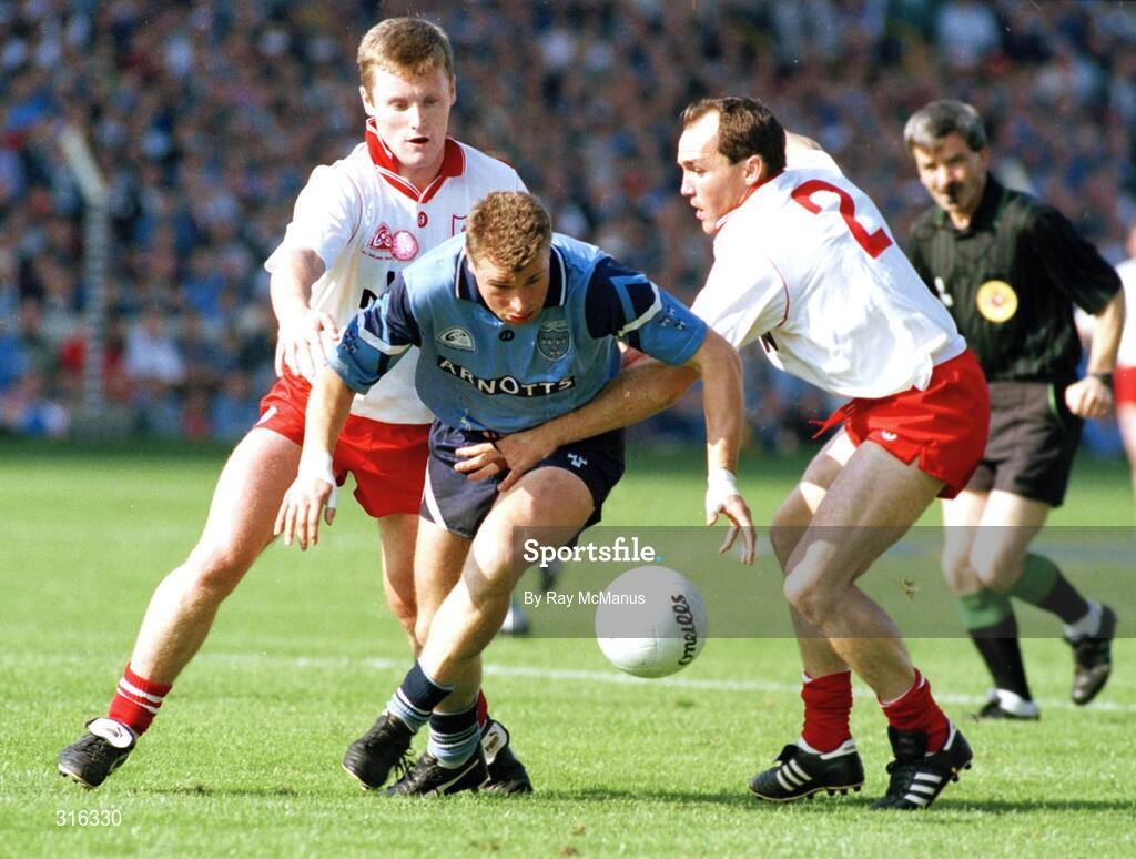 17 September 1995; Charlie Redmond, Dublin, in action against Tyrone's Seamus McCallan, left, and Paul Devlin, right. Bank of Ireland All-Ireland Senior Football Championship Final, Dublin v Tyrone, Croke Park, Dublin. Picture credit; Ray McManus / SPORTSFILE