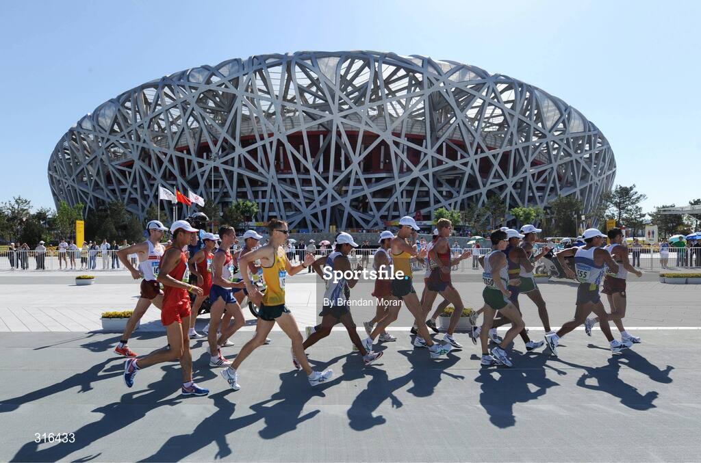 16 August 2008; The main bunch of walkers, including Robert Heffernan, 2050, Ireland, pass by the National Stadium, during the Men's 20km Walk Final. Beijing 2008 - Games of the XXIX Olympiad, National Stadium, Olympic Green, Beijing, China. Picture credit: Brendan Moran / SPORTSFILE