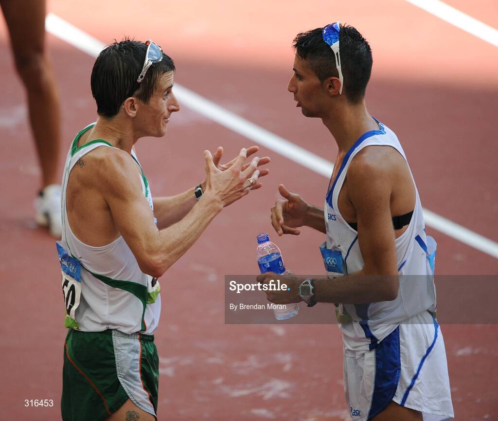 16 August 2008; Robert Heffernan, left, Ireland, in conversation with Giorgio Rubino, of Italy, after finishing in 8th place in the Men's 20km Walk Final, in a time of 1.20.36. Beijing 2008 - Games of the XXIX Olympiad, National Stadium, Olympic Green, Beijing, China. Picture credit: Brendan Moran / SPORTSFILE