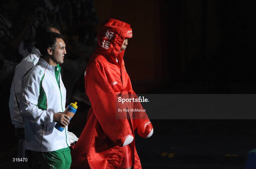 16 August 2008; Darren Sutherland, Ireland, arrives with head coach Billy Walsh and technical coach Zaur Antia before his bout with Nabil Kassel, from Algeria, in the 'round of 16' Middle weight, 75kg, contest. Beijing 2008 - Games of the XXIX Olympiad, Beijing Workers Gymnasium, Olympic Green, Beijing, China. Picture credit: Ray McManus / SPORTSFILE