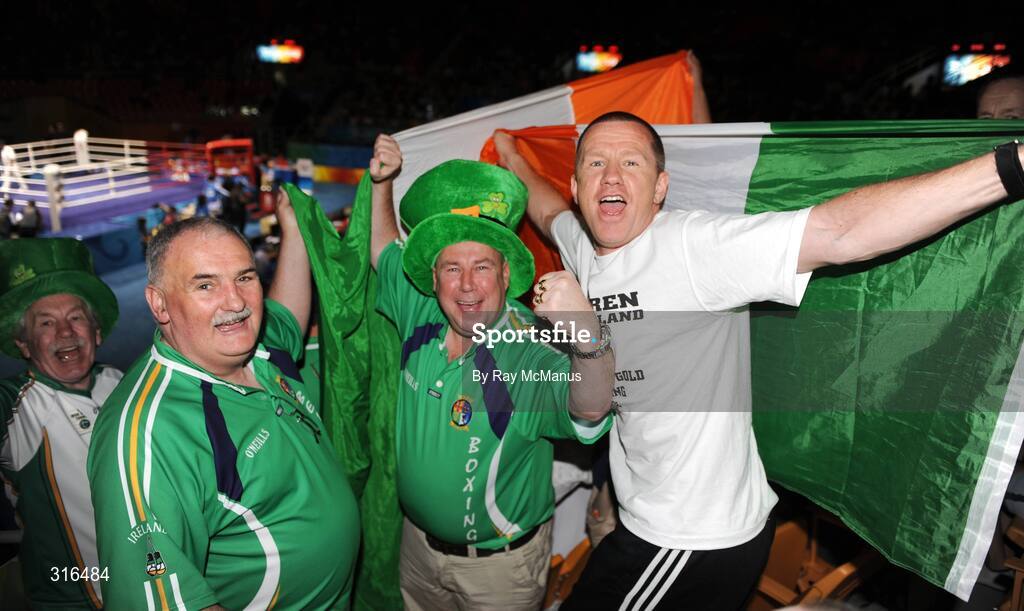 16 August 2008; Dominic O'Rourke, President of the Irish Amateur Boxing Association, IABA, left, Martin Fennessy, Clonmel, Co. Tipperary and Derek Ahern, from St. Saviors Club in Dublin celebrate Darren Sutherland's victory in the 'round of 16' Middle weight, 75kg, contest. Beijing 2008 - Games of the XXIX Olympiad, Beijing Workers Gymnasium, Olympic Green, Beijing, China. Picture credit: Ray McManus / SPORTSFILE