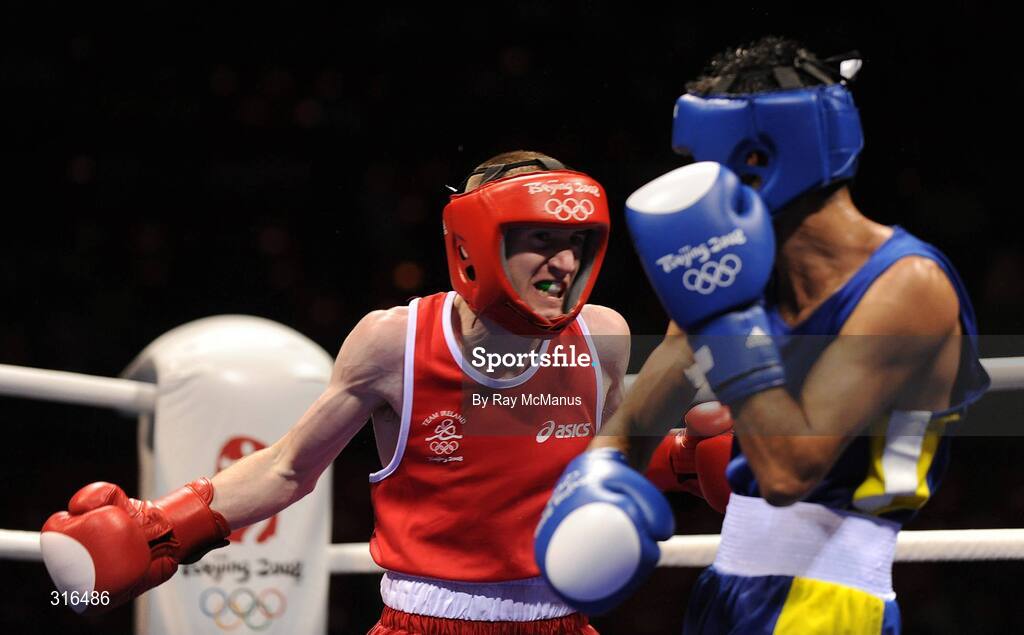 16 August 2008; Paddy Barnes, Ireland, in action against Jose Luis Meza, from Ecuador, during the 'round of 16' Light Fly weight, 48kg, contest. Beijing 2008 - Games of the XXIX Olympiad, Beijing Workers Gymnasium, Olympic Green, Beijing, China. Picture credit: Ray McManus / SPORTSFILE
