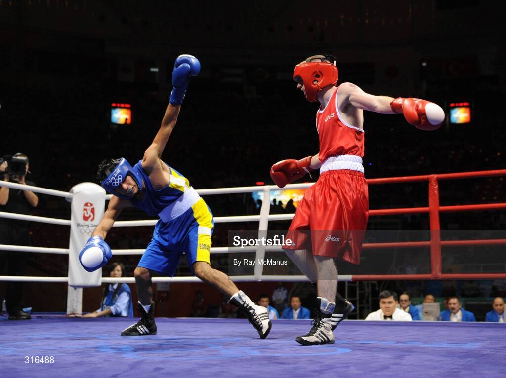 16 August 2008; Paddy Barnes, Ireland, in action against Jose Luis Meza, from Ecuador, left, during the 'round of 16' Light Fly weight, 48kg, contest. Beijing 2008 - Games of the XXIX Olympiad, Beijing Workers Gymnasium, Olympic Green, Beijing, China. Picture credit: Ray McManus / SPORTSFILE